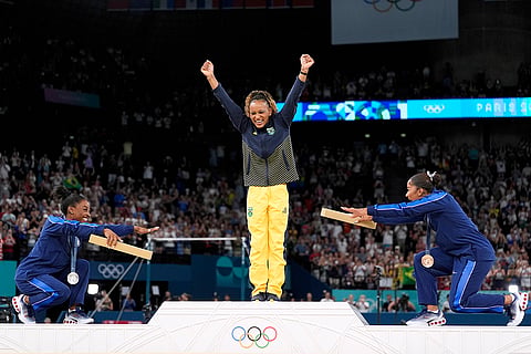 Simone Biles and Jordan Chiles bow to gold medalist Rebeca Andrade